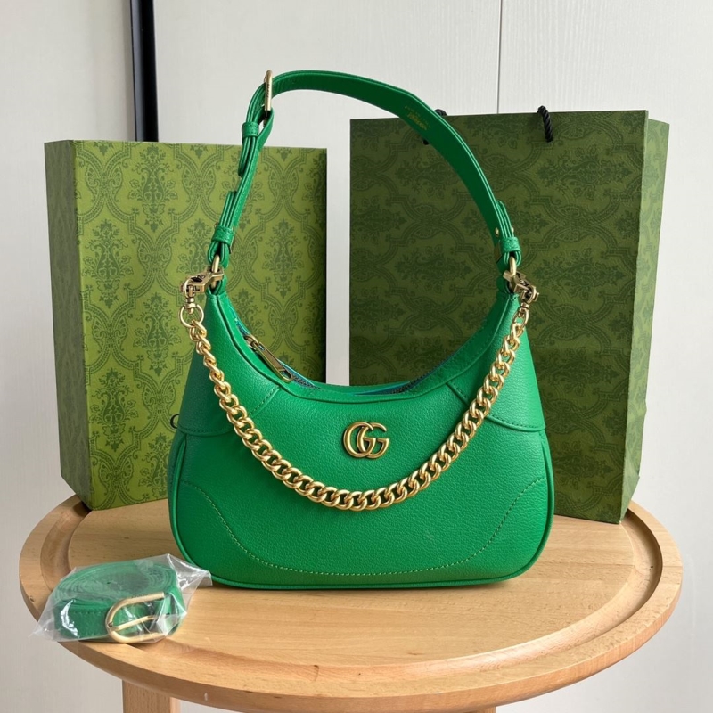 G*u*i top handle bags